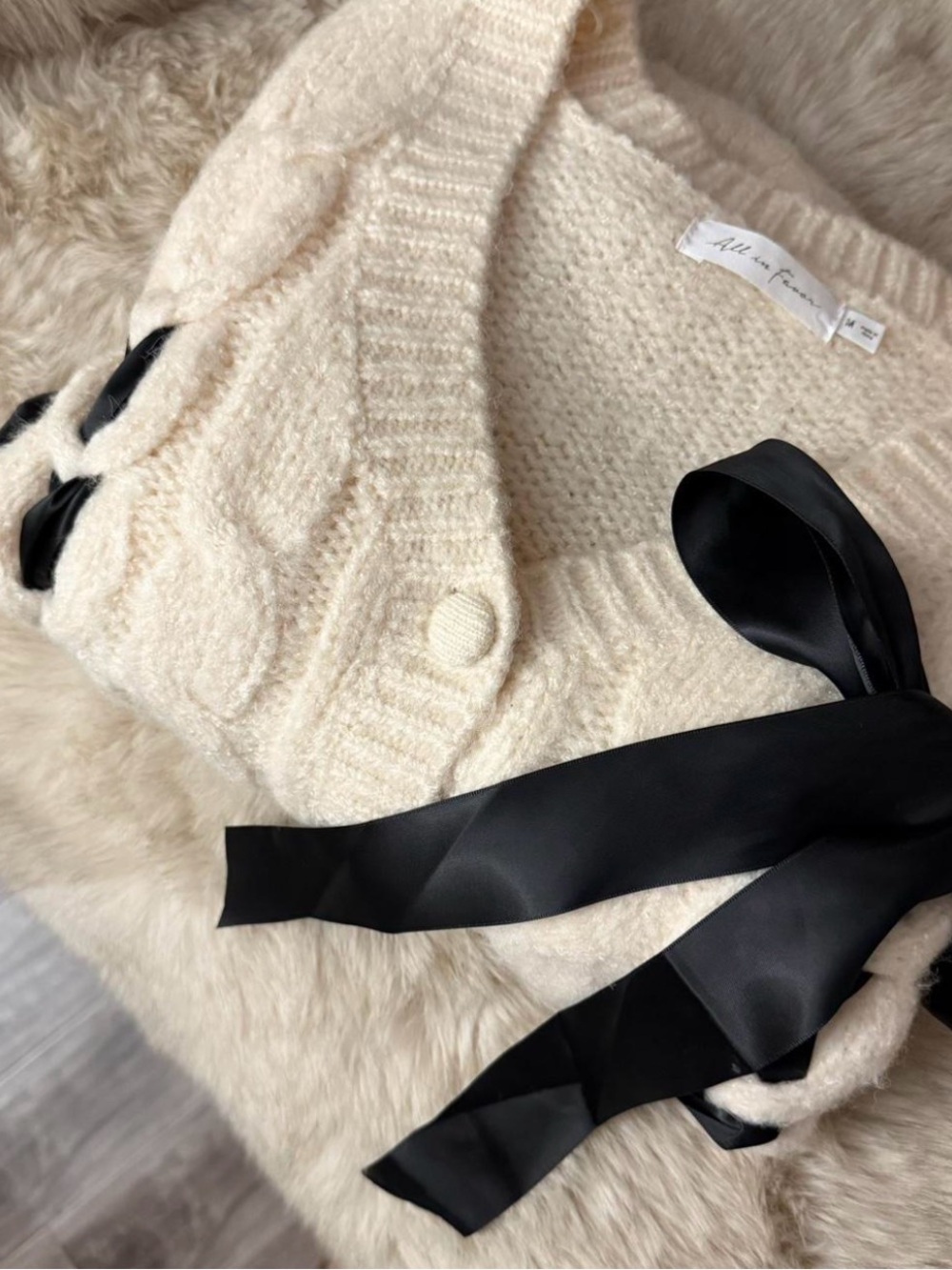 All in Favor Cream Cable Knit Cardigan with Black Ribbon Trim